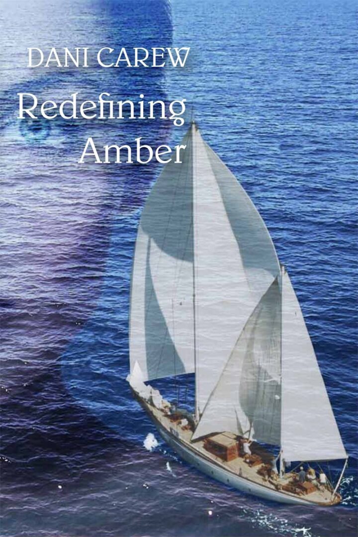 A sail boat in the ocean with text that reads " redefining amber ".