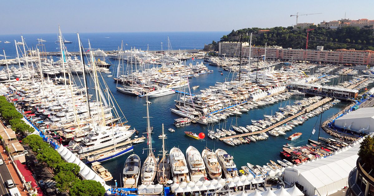 A bunch of boats are parked in the water